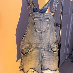 Kids overalls with lace at the bottom